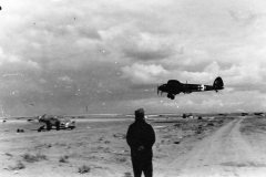 Bf109_F_5.JG_27_and_He111_Martuba_airfield_Africa_1942