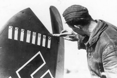 Luftwaffe_Airman_Recording_a_Kill_on_Rudder_Bf110