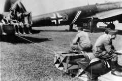 German_Crew_Hauling_Bombs_to_He111_of_KG_54_Totenkopf_1940