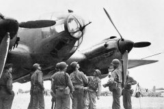 US_Soldiers_with_Captured_Luftwaffe_He111_Bomber_North_Africa