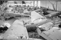 hangar_full_of_wrecked_He111_at_Schmarbeck_April_1945
