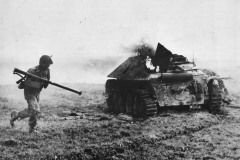 29th_ID_soldier_by_knocked-out_Hetzer_1944