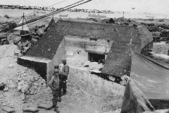 American_Soldiers_at_German_Pillbox_Ruquet_on_D-Days_Omaha_Beach_Normandy_1944