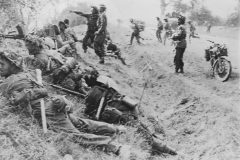 British_Troops_Break_Through_Caen_France_Normandy_1944