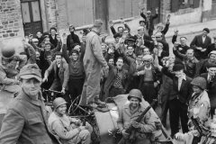 Civilians_Cheer_US_Forces_Entering_Barneville_France_June_1944