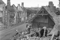 French_Civilians_and_Firemen_Start_Reconstruction_in_Carentan_Normandy_1944
