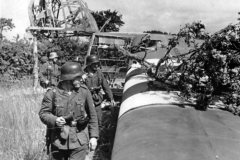 German_troops_examine_an_destroyed_Waco_CG-4_glider_Normandy_June_1944