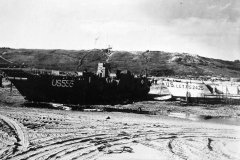 LCT_stuck_on_the_beach_Normandy_Invasion