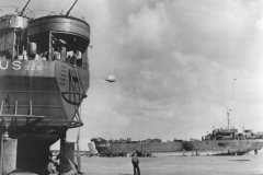 LST_326_and_388_Unloading_on_Normandy_Beach_during_Low_Tide_June_1944
