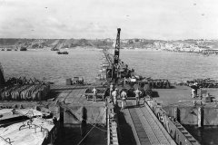 Mulberry_harbour_A_off_D-Day_Omaha_Beach_in_background_at_Saint-Laurent-sur-Mer