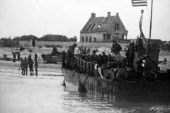 Normandy_invasion_D-Day_US_LST_and_Soldiers