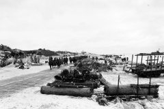 Scene_on_Utah_Beach_with_troops_marching_up_the_road_9_June_1944
