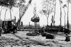 US_Army_Ordnance_Unit_Loads_Ammo_into_2_12_Ton_Truck_Normandy_France_44