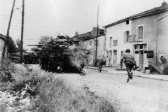 US_Army_Troops_in_action_Rachecourt_Normandy_1944