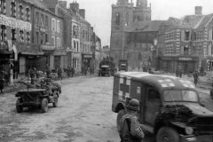 US_Jeeps_and_Dodge_WC_Ambulance_on_Streets_of_La_Haye-Du-Puits