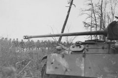 POWs_and_knocked_out_German_Panther_Ausf_G_Sinz_94th_Inf_3rd_Army
