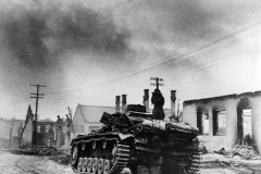 German_tank_officer_atop_Panzer_III_on_outskirts_of_Wjasma_1941