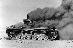 Panzer_III_Tank_Burning_in_Egyptian_Desert