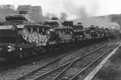 Panzer_III_being_transported_on_rail_car