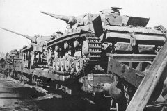 Panzer_III_tanks_being_transported_on_rail_cars