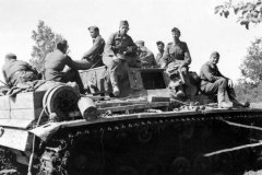 Tank_Crews_atop_Panzer_III_ost